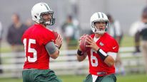 Tim Tebow and Mark Sanchez