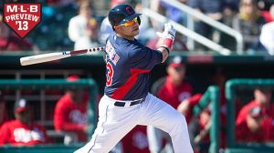 Nick Swisher #33 of the Cleveland Indians singles in a run in the first inning during a spring training game against the Cincinnati Reds at Goodyear Ballpark on February 22, 2013 in Goodyear, Arizona.