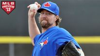 Pitcher R. A. Dickey #43 of the Toronto Blue Jays starts against the Boston Red Sox during a preason game February 25, 2013 at the Florida Auto Exchange Stadium in Dunedin, Florida.