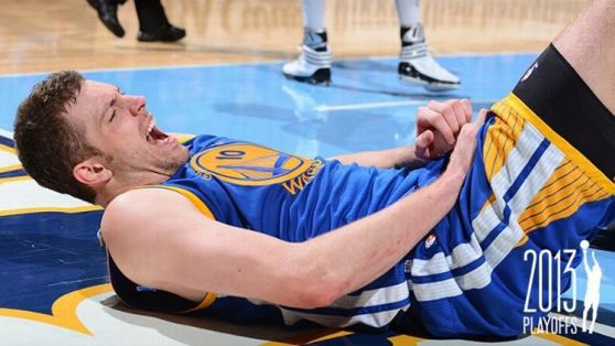 David Lee #10 of the Golden State Warriors reacts after sustaining an injury while playing against the Denver Nuggets in Game One of the Western Conference Quarterfinals during the 2013 NBA Playoffs on April 20, 2013 at the Pepsi Center in Denver, Colorad