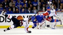 Washington Capitals left wing Martin Erat, of the Czech Republic, and New York Rangers right wing Derek Dorsett