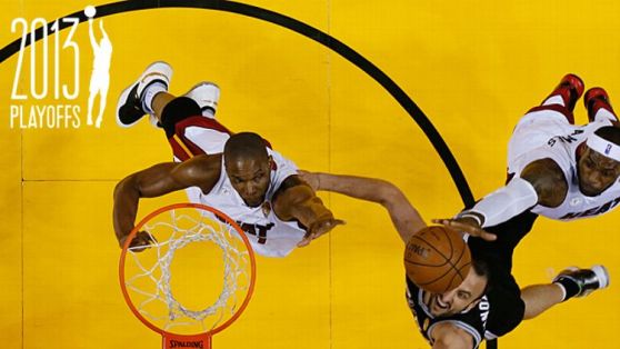 Miami Heat center Chris Bosh (1), left, and forward LeBron James (6) block a shot to the basket by San Antonio Spurs guard Manu Ginobili 