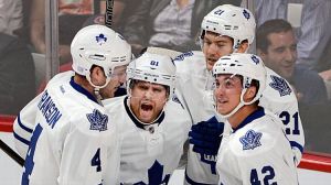  James van Riemsdyk (21) celebrates with teammates Cody Franson (4), Phil Kessel (81) and Tyler Bozak