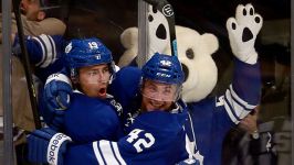 Tyler Bozak #42 and Joffrey Lupul #19 of the Toronto Maple Leafs