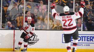 Andy Greene #6 and Eric Gelinas #22 of the New Jersey Devils