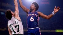 Julius Erving #6 of the Philadelphia 76ers goes up for a shot against John Havlicek #17 of the Boston Celtics during a game played in 1975 at the Boston Garden in Boston, Massachusetts. 