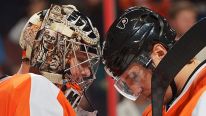 Steve Mason #35 and Luke Schenn #22 of the Philadelphia Flyers