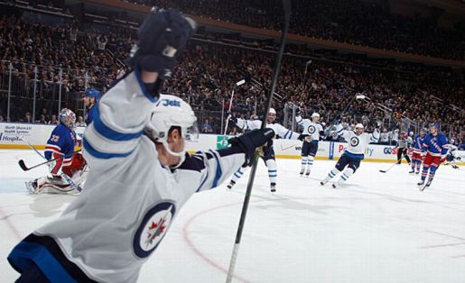 John Albert #70 and the Winnipeg Jets
