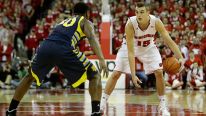 Sam Dekker #15 of the Wisconsin Badgers dribbles the basketball during the second half against the Marquette Golden Eagles at Kohl Center on December 07, 2013 in Madison, Wisconsin.