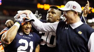 Auburn's Tre Mason and Gus Malzahn celebrate