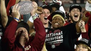 Jimbo Fisher and Jameis Winston celebrate Florida State's BCS Championship win
