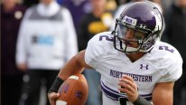 Quarterback Kain Colter #2 of the Northwestern Wildcats